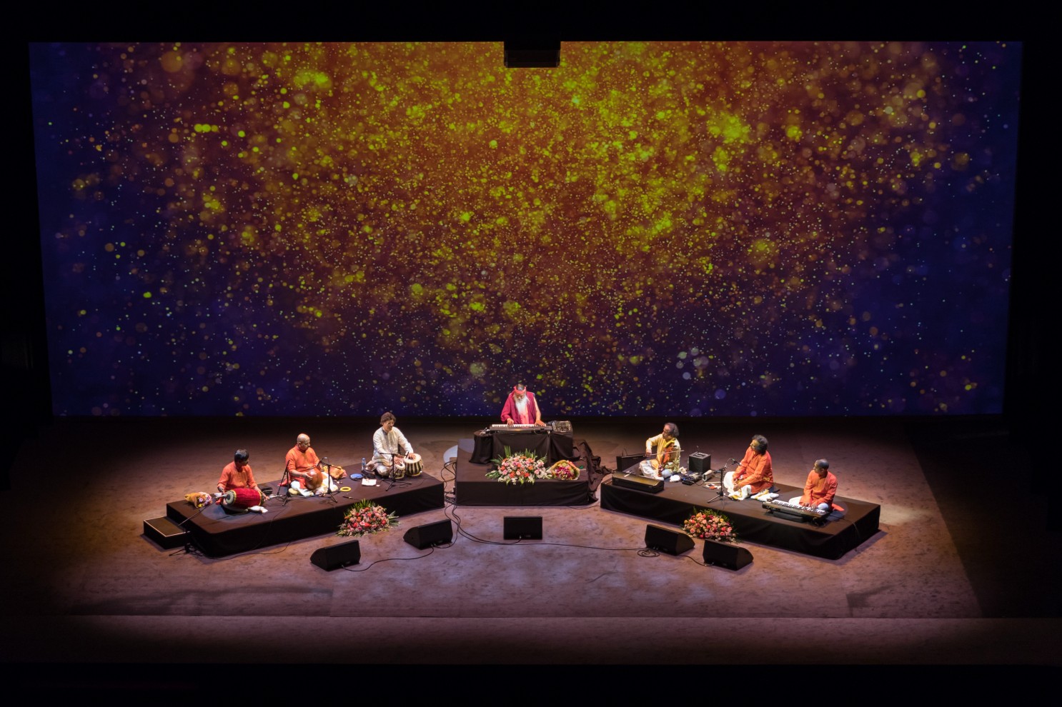 Healing Music Experience — Sri Swamiji with ensemble, starfield backdrop