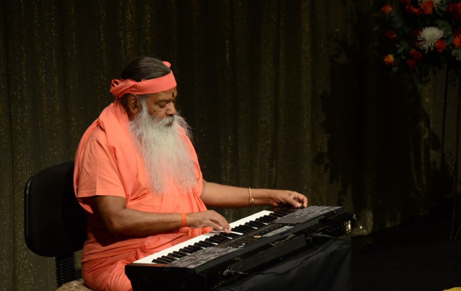 Sri Swamiji performing — Healing Music Experience stage
