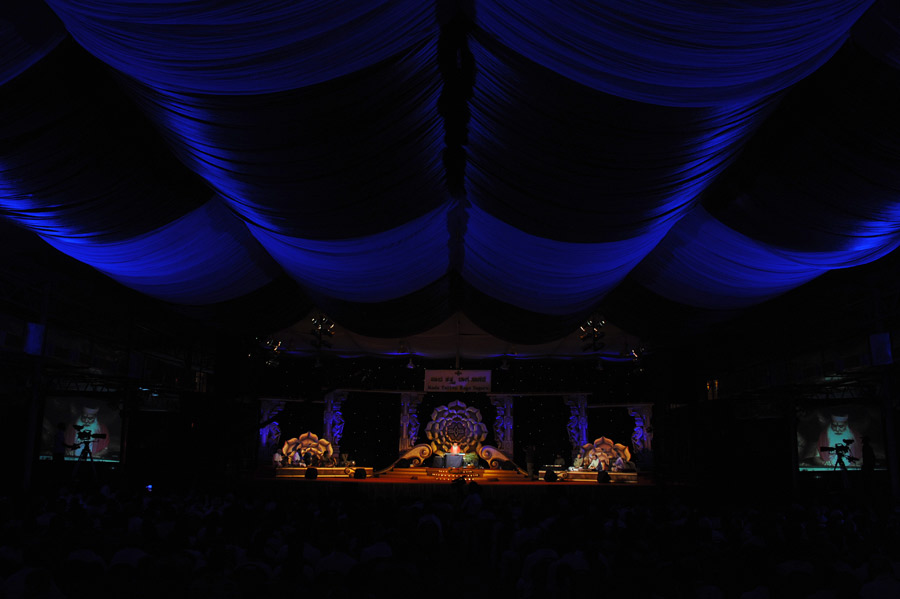Healing Music Experience stage — blue tent venue, wide view